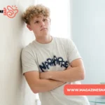 Ryan Trahan net worth feature image with creator leaning against a wall in casual clothing