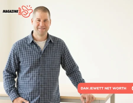 Dan Jewett net worth 2026 - man in blue plaid shirt smiling indoors