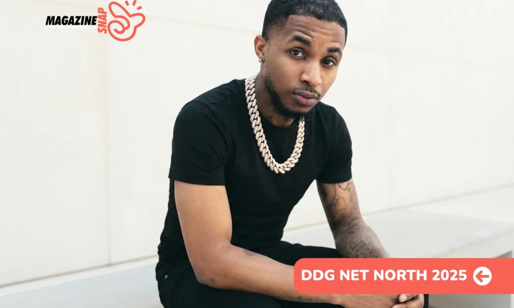 DDG net worth 2025 portrait, rapper in black tee and diamond chain seated outdoors