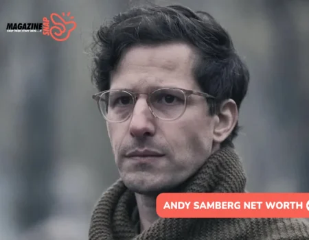 Andy Samberg in glasses and a knit scarf, close-up for the Andy Samberg net worth article