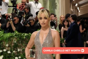 Camila Cabello net worth photo: sequined gown, red carpet, updo hairstyle.
