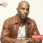 DMX seated in a brown leather jacket and layered chains for the DMX net worth article