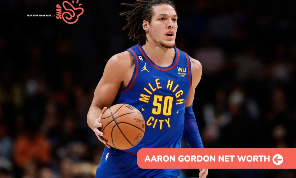 Aaron Gordon net worth article photo: Nuggets forward dribbling in "Mile High City" jersey