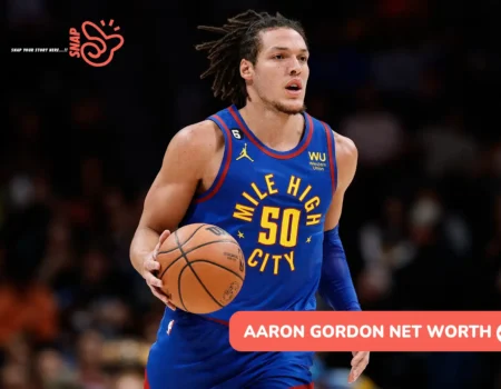 Aaron Gordon net worth article photo: Nuggets forward dribbling in "Mile High City" jersey