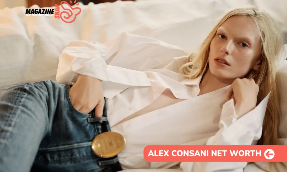Alex Consani Net Worth 2026 – $1M Estimate, Model of the Year Alex Consani Net Worth in a white shirt and denim overalls, featured for the Alex Consani article.