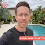 Bobby Parrish net worth smiling in a poolside setting for the Bobby Parrish article