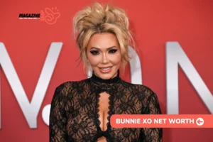 Blonde-haired Bunnie Xo smiling in a black lace top against a red backdrop, for Bunnie Xo net worth article